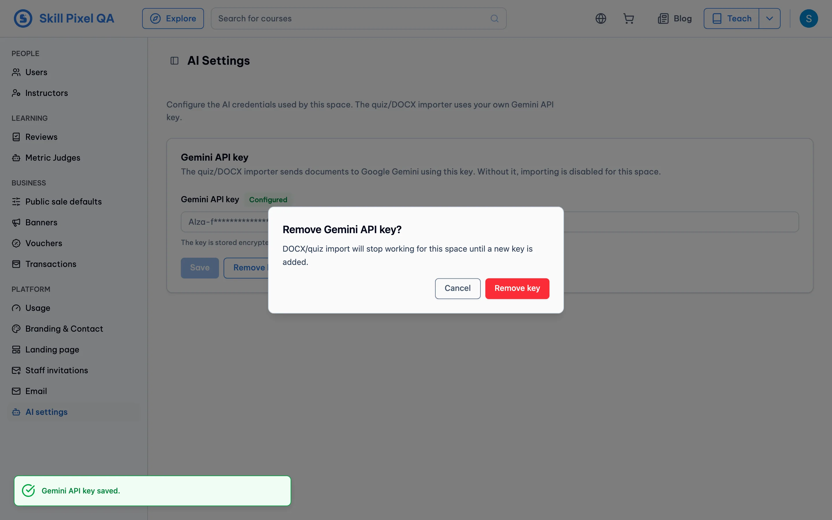 Admin AI settings page with a confirmation dialog before removing the key